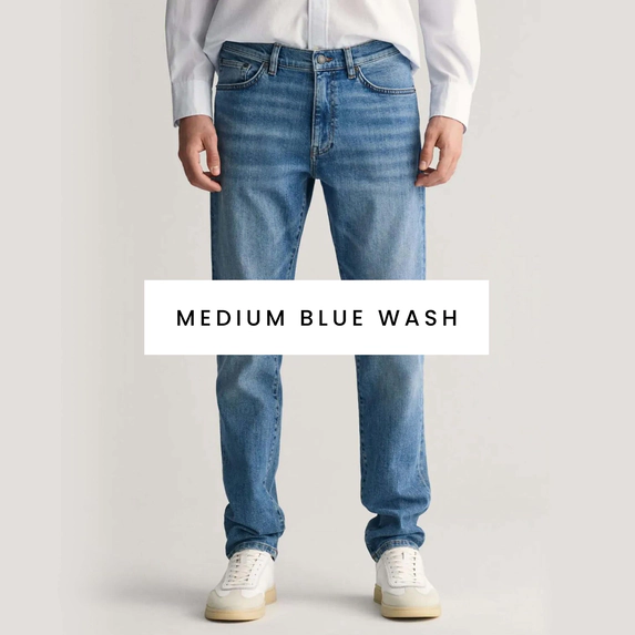Men's Medium Blue Wash Jeans. Shop now.